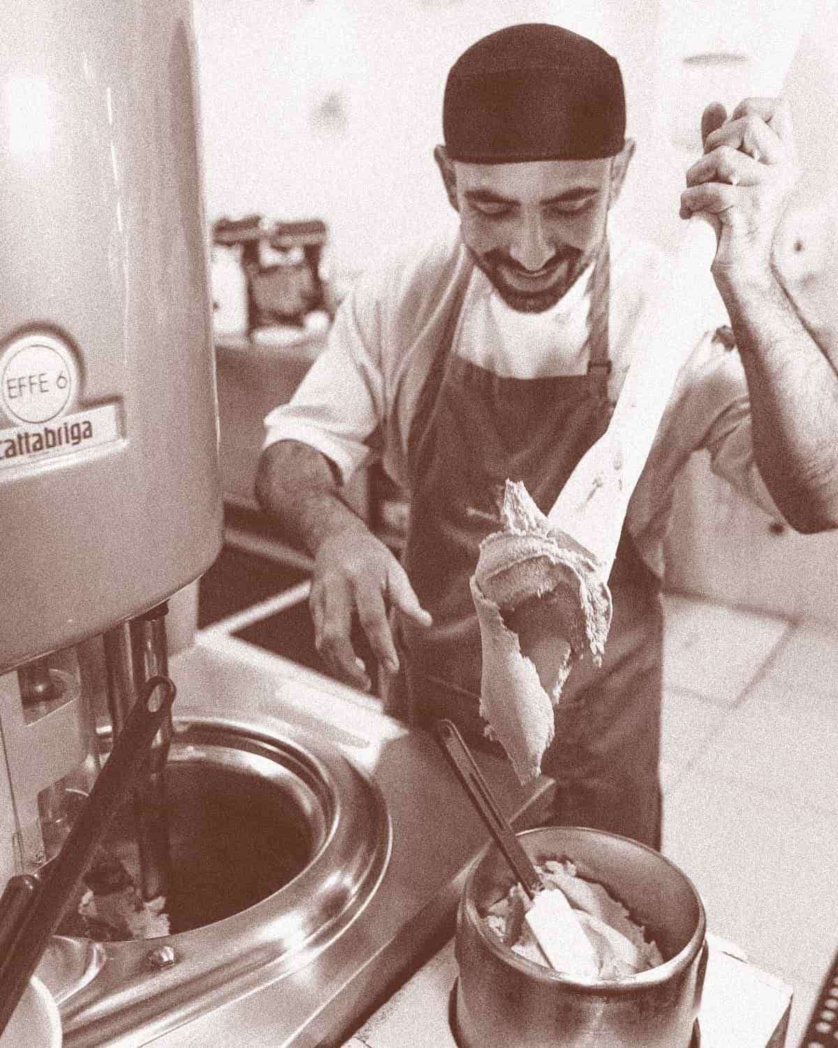 Gelato maker making gelato